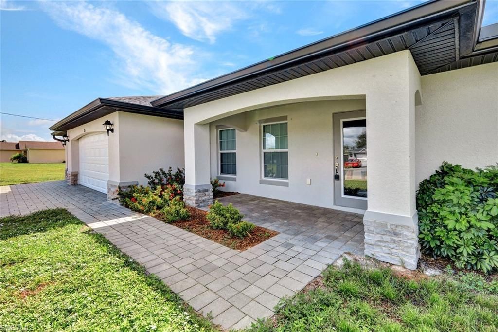216 NW 9th TER, CAPE CORAL, FL 33993 — photo 4