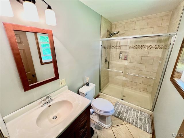 18 Pond Path, Oswego, NY 13126