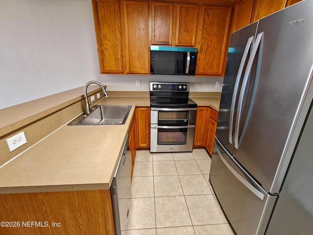 1500 CALMING WATER Drive 403, Fleming Island, FL 32003