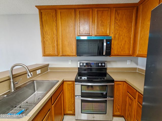 1500 CALMING WATER Drive 403, Fleming Island, FL 32003