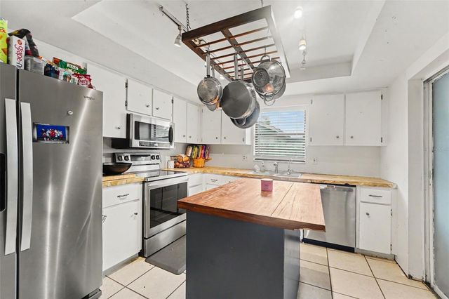 1215 PERSIMMON DRIVE, Holiday, FL 34691