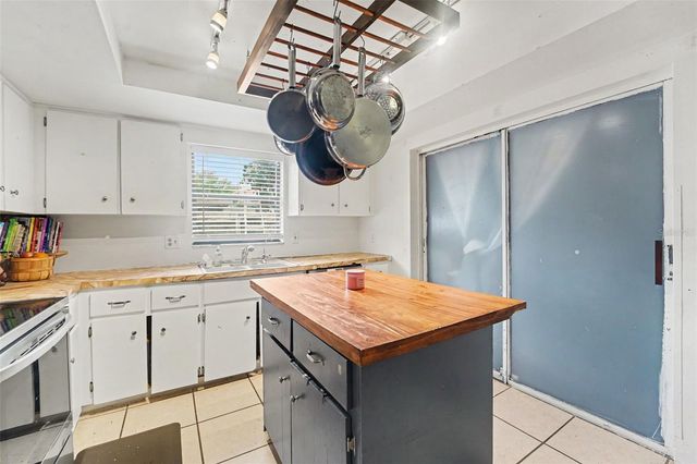 1215 PERSIMMON DRIVE, Holiday, FL 34691