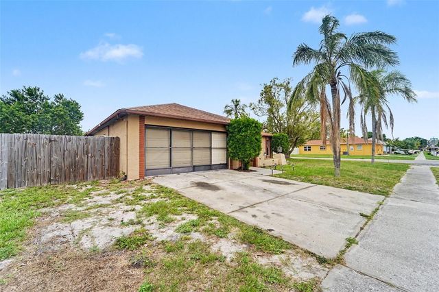 1215 PERSIMMON DRIVE, Holiday, FL 34691