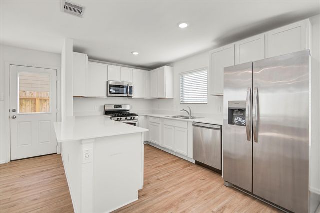 24027 Wandering Brook Drive, Hockley, TX 77447