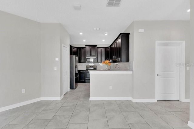 1051 QUAKER RIDGE LANE, Davenport, FL 33896