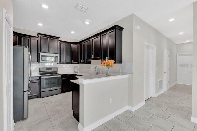 1051 QUAKER RIDGE LANE, Davenport, FL 33896