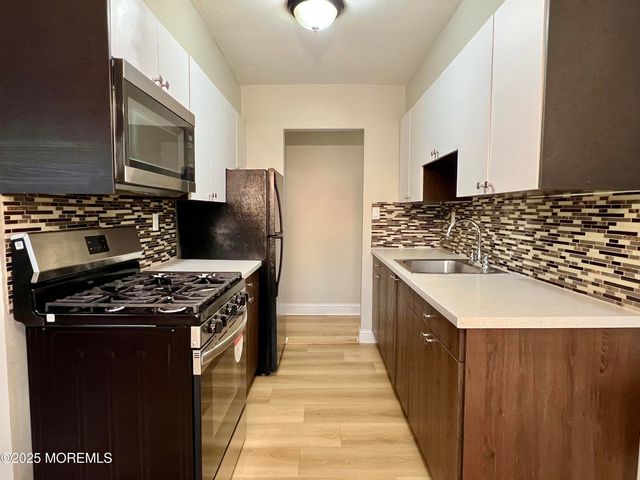 12 Manchester Court H, Freehold, NJ 07728