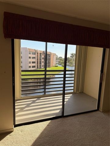 10442 Sunrise Lakes Boulevard 303, Sunrise, FL 33322