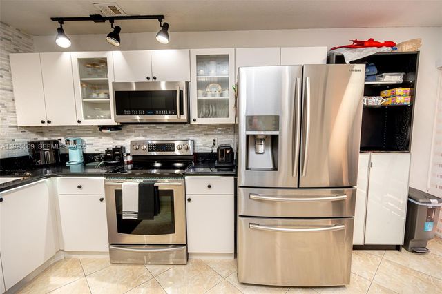 9955 Costa Del Sol Blvd H-108B, Doral, FL 33178