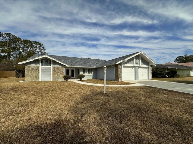 100 WEBSTER LANE, Palm Coast, FL 32164