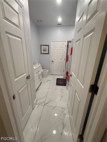 302 NW 24th AVE, Cape Coral, FL 33993