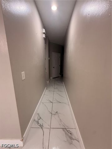 302 NW 24th AVE, Cape Coral, FL 33993