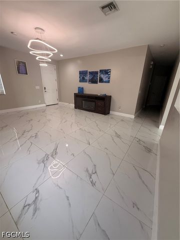 302 NW 24th AVE, Cape Coral, FL 33993