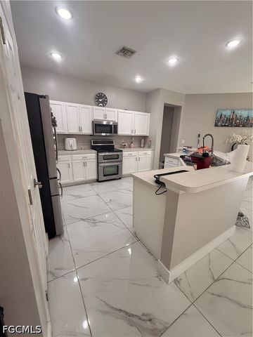 302 NW 24th AVE, Cape Coral, FL 33993