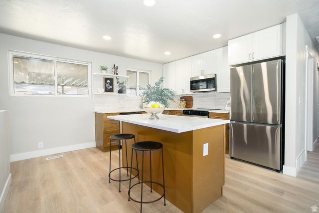 5552 S SOUTH HEW WOOD DR, Taylorsville, UT 84129