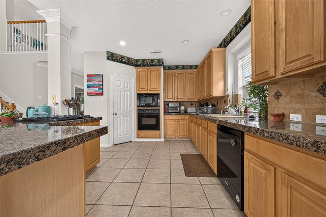 214 Kentwood Ridge Court, Sugar Land, TX 77479