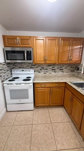 9641 Sunrise Lakes Boulevard 305, Sunrise, FL 33322