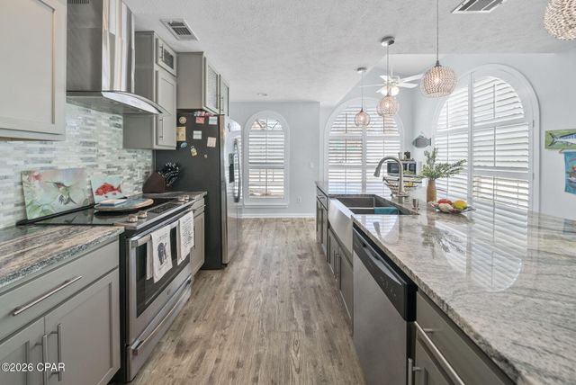 7016 S Lagoon Drive, Panama City Beach, FL 32408