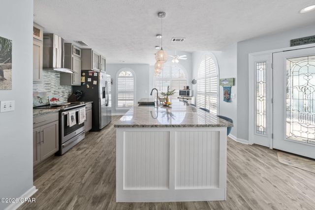7016 S Lagoon Drive, Panama City Beach, FL 32408