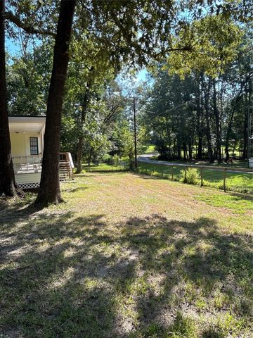437 Gov Wood Drive, Point Blank, TX 77364