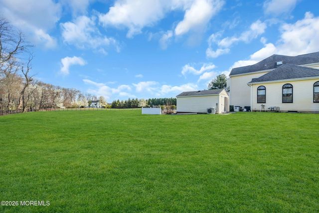 8 Kudyba Court, Manalapan, NJ 07726