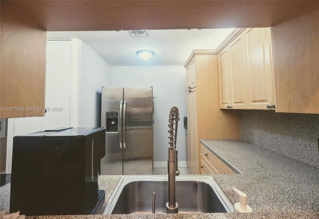 679 Racquet Club Rd 4, Weston, FL 33326