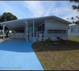 701 Gladiolus Drive, Barefoot Bay, FL 32976