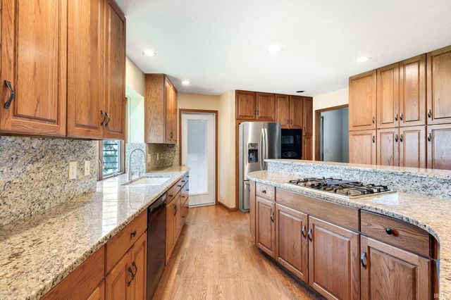 51945 Lake Knoll Court, Granger, IN 46530