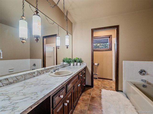 7990 Tim Tam Trl, Evergreen, CO 80439