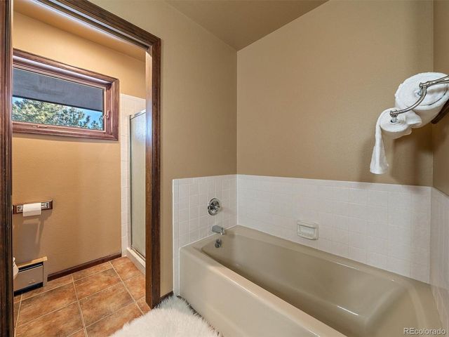 7990 Tim Tam Trl, Evergreen, CO 80439