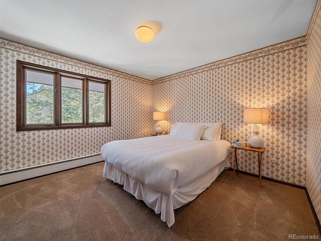 7990 Tim Tam Trl, Evergreen, CO 80439