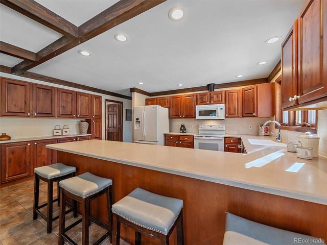 7990 Tim Tam Trl, Evergreen, CO 80439