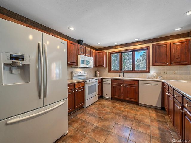 7990 Tim Tam Trl, Evergreen, CO 80439