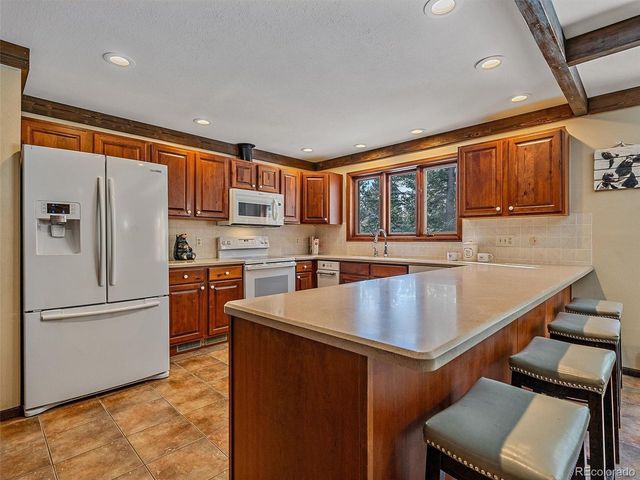 7990 Tim Tam Trl, Evergreen, CO 80439