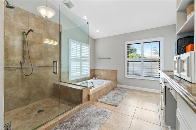 12856 Bald Cypress LN, Naples, FL 34119