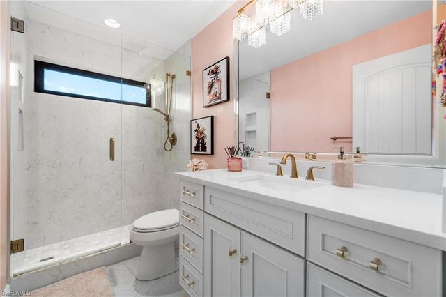 12856 Bald Cypress LN, Naples, FL 34119