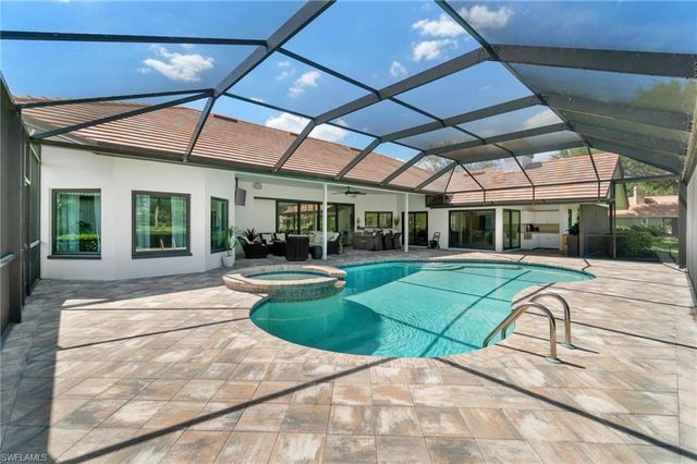 12856 Bald Cypress LN, Naples, FL 34119