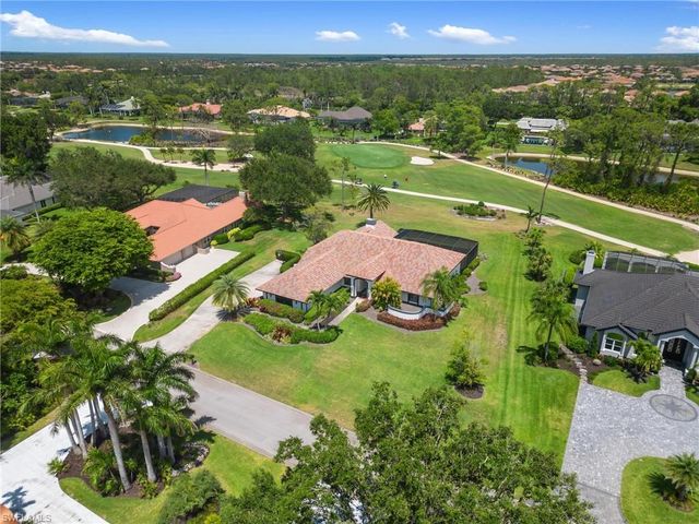 12856 Bald Cypress LN, Naples, FL 34119