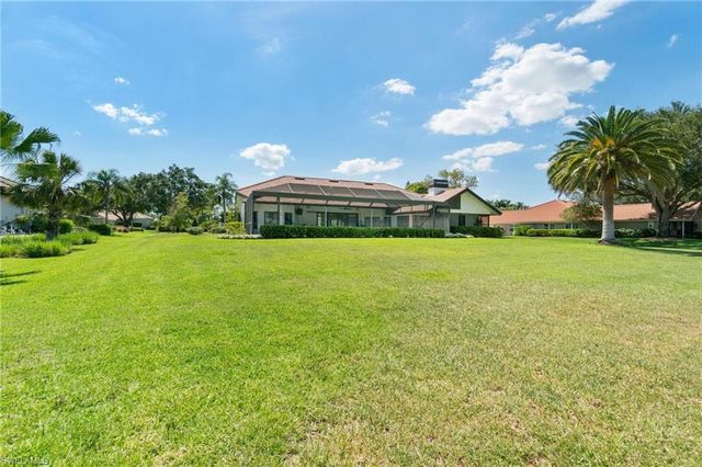 12856 Bald Cypress LN, Naples, FL 34119
