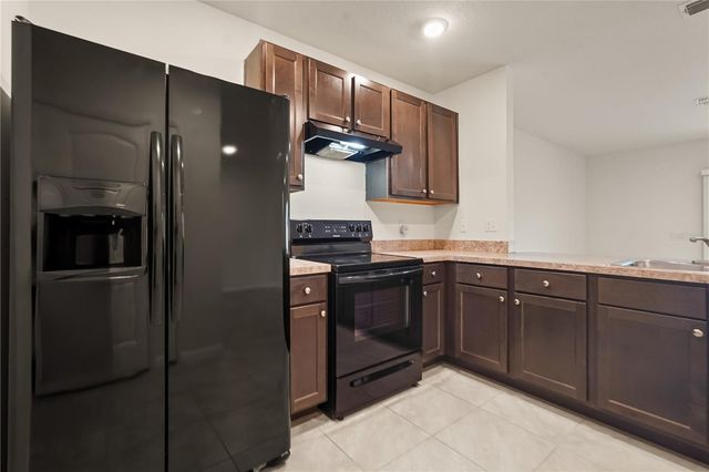 9031 WILDFLOWER LANE, Kissimmee, FL 34747