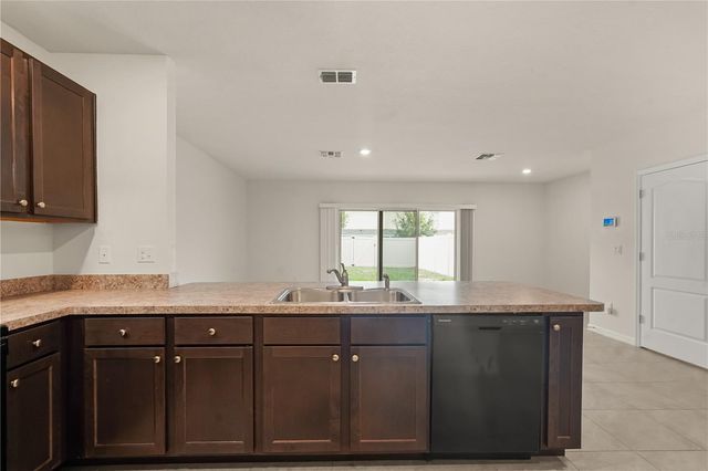 9031 WILDFLOWER LANE, Kissimmee, FL 34747