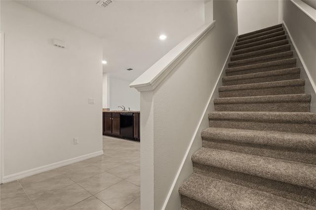 9031 WILDFLOWER LANE, Kissimmee, FL 34747