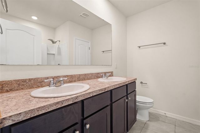 9031 WILDFLOWER LANE, Kissimmee, FL 34747