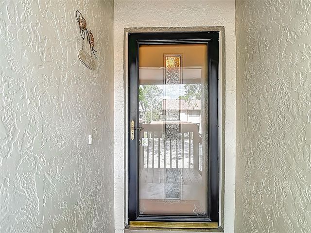 8308 SANDWEDGE CIRCLE C, Hudson, FL 34667