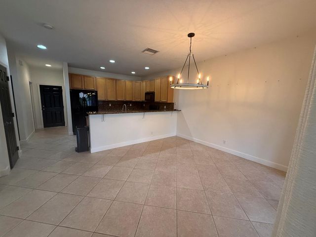 114 Owl Pointe Circle, Jupiter, FL 33458