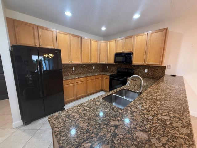 114 Owl Pointe Circle, Jupiter, FL 33458