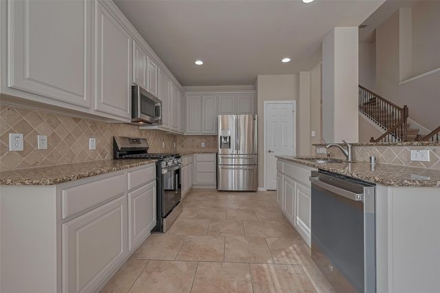 15 Wenoah Place, The Woodlands, TX 77389