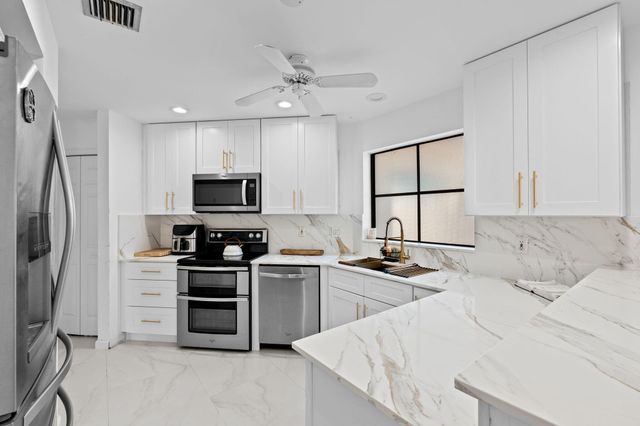 111 Weybridge Circle, Royal Palm Beach, FL 33411