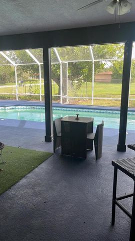 1698 SW FLINT Street, Port St. Lucie, FL 34953