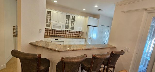 179 Las Brisas Circle, Hypoluxo, FL 33462